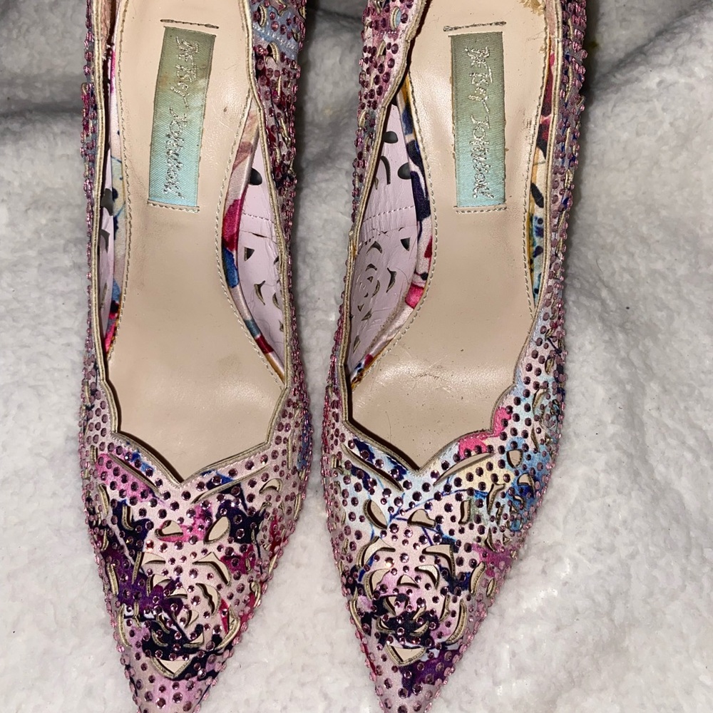 These are the “New Blue” by Betsey Johnson. These heels are lightly worn!